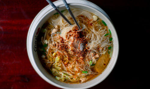 Noodles in bowl on table