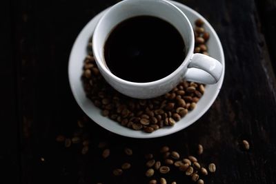 High angle view of coffee cup on table