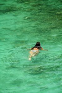 Woman swimming in pool