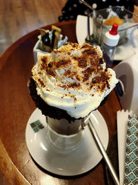 Close-up of coffee and cake on table