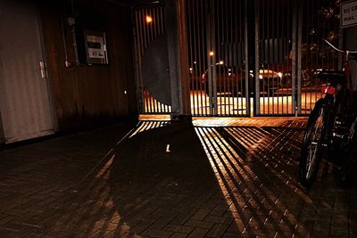 Empty walkway at night