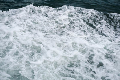 High angle view of waves in sea