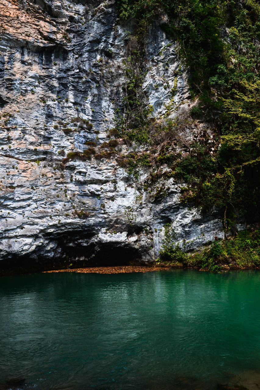 SCENIC VIEW OF LAKE AND ROCKS