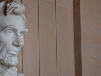 Close-up of statue against wall