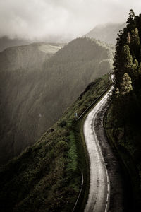 Road on mountain against sky