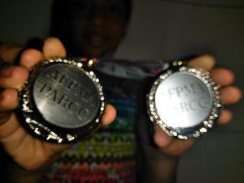 Close-up of hand holding paper