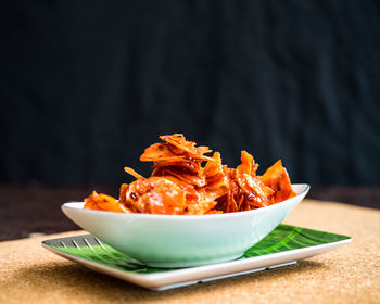 Kerepek pedas or crackers made of cassava or tapioca. sliced, fried and cooked with chilli.