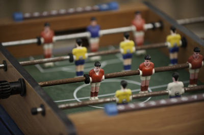 High angle view of figurines on foosball table