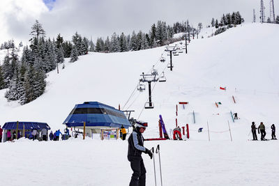 Group of people on snow covered land