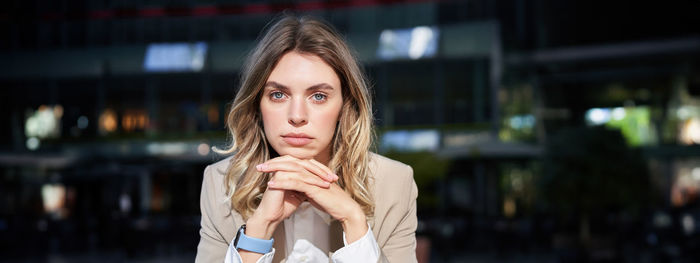 Portrait of young woman looking away