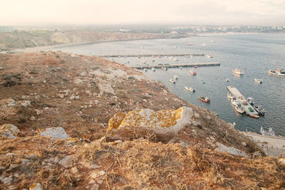 High angle view of rocks by sea
