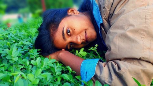 Portrait of cute girl with plants