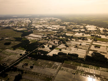 High angle view of city buildings against sky