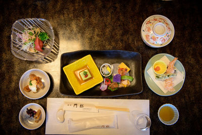 High angle view of sushi served on table