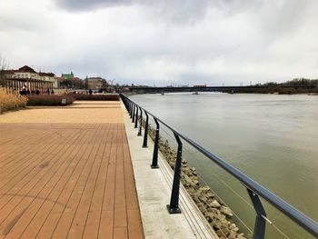 Bridge over river against sky