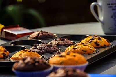 Close-up of cookies in baking sheet on table