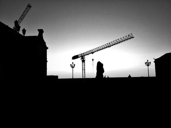 Silhouette of people at sunset