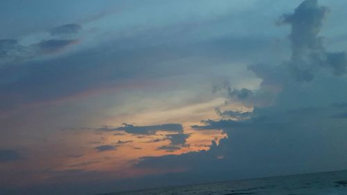 Scenic view of sea against sky at sunset