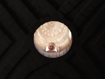 Portrait of smiling girl in historic building