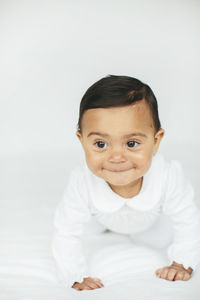 Smiling baby crawling