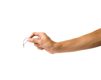 Close-up of human hand against white background