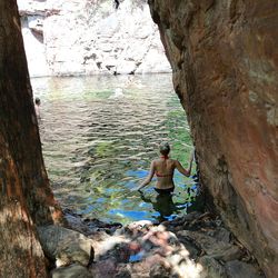 Woman standing in water