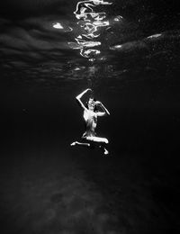 Girl swimming in sea