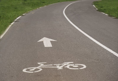 Arrow sign on road