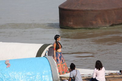 Friends traveling in boat