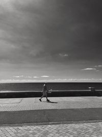 Silhouette of woman in sea