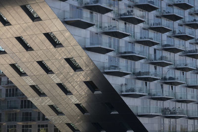 Netherlands, north holland, amsterdam, rows of balconies of sluishuis apartment building