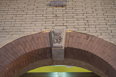 Low angle view of stone wall of old building