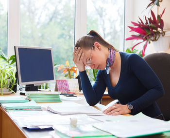 Woman working on table