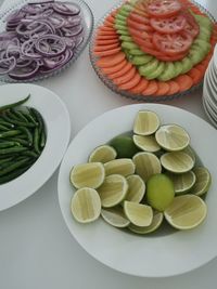 High angle view of fruits in plate on table