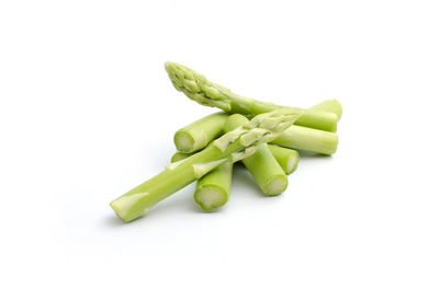 Close-up of green pepper against white background