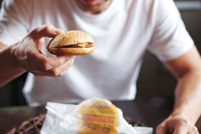 Close-up of man holding ice cream