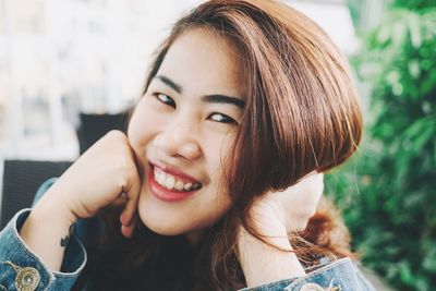 Portrait of a smiling young woman