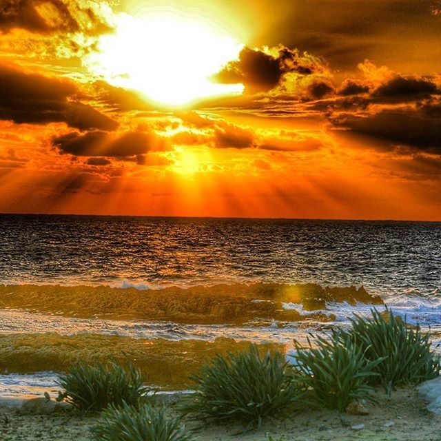 sunset, sea, sun, water, horizon over water, sky, scenics, beauty in nature, tranquil scene, orange color, tranquility, beach, idyllic, cloud - sky, nature, reflection, sunlight, shore, sunbeam, cloud