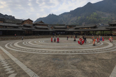 People performing arts outside traditional buildings