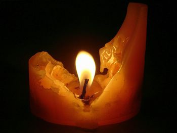 Close-up of illuminated candle