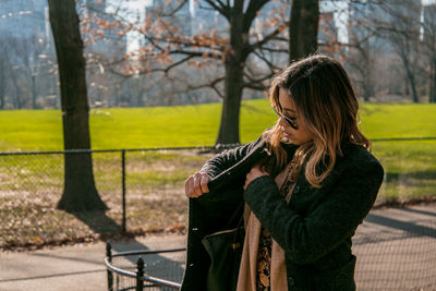 Woman standing in park