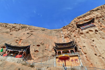 0948 polychrome wooden roof-chapel in qianfo thousand buddha grottoes-mati si temple. zhangye-china.