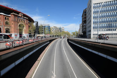 Road in city against sky