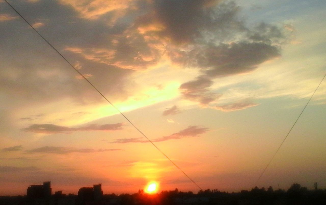 sunset, sun, silhouette, sky, orange color, power line, scenics, beauty in nature, electricity pylon, cloud - sky, tranquil scene, tranquility, sunlight, nature, idyllic, cable, sunbeam, cloud, electricity, power supply