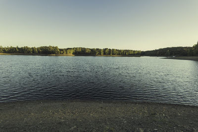 Scenic view of lake against clear sky