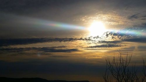 Scenic view of dramatic sky at sunset