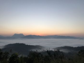 Scenic view of mountains against sky during sunset