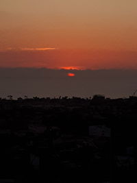 Scenic view of silhouette landscape against romantic sky at sunset