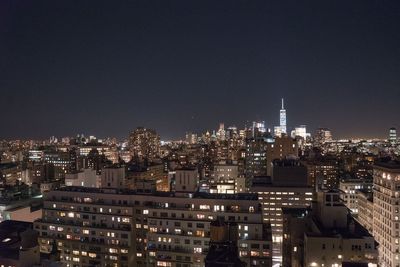 Illuminated cityscape at night