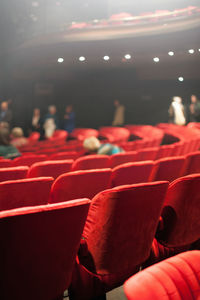 Red chairs in theater